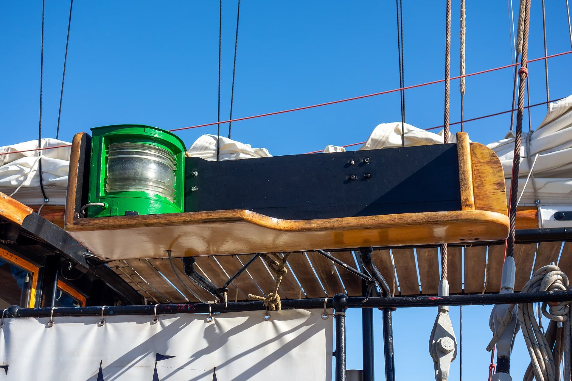 A green navigation light — the legal night signal a camera cannot replace